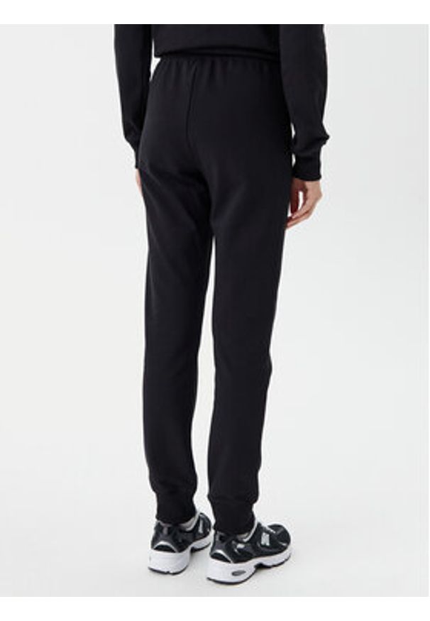 Champion Spodnie dresowe 118101 Czarny Slim Fit. Kolor: czarny. Materiał: bawełna