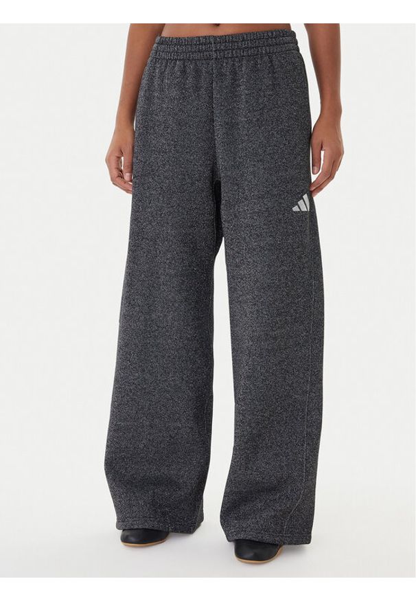 Adidas - adidas Spodnie dresowe ALL SZN Holiday Glitter Fleece JX4360 Szary Loose Fit. Kolor: szary. Materiał: bawełna