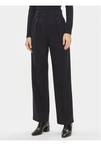 TOMMY HILFIGER - Tommy Hilfiger Spodnie materiałowe Core WW0WW39725 Granatowy Relaxed Fit. Kolor: niebieski. Materiał: wiskoza, syntetyk #1