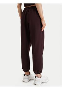 Calvin Klein Jeans Spodnie dresowe Monologo LV047B235G Brązowy Regular Fit. Kolor: brązowy. Materiał: bawełna #4
