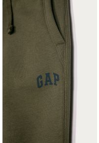 GAP - Spodnie dziecięce 104-176 cm. Kolor: zielony. Materiał: bawełna, poliester, dzianina. Wzór: gładki #2