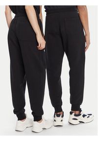 AMI PARIS - AMI Paris Spodnie dresowe UTR240.747 Czarny Regular Fit. Kolor: czarny. Materiał: bawełna #4