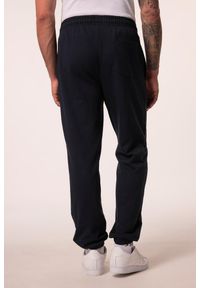 JAY-PI - Męskie Spodnie dresowe Iron Anvil fitness krój podstawowy do rozm. 7XL. Kolekcja: plus size. Kolor: niebieski. Materiał: materiał, poliester, bawełna. Długość: długie. Sport: fitness