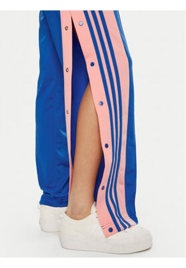 Adidas - adidas Spodnie dresowe Adibreak JP2307 Niebieski Loose Fit. Kolor: niebieski. Materiał: syntetyk