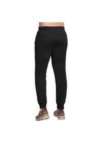 skechers - Spodnie treningowe męskie Skechers GO Walk Expedition. Kolor: czarny. Materiał: dresówka. Sport: fitness #2