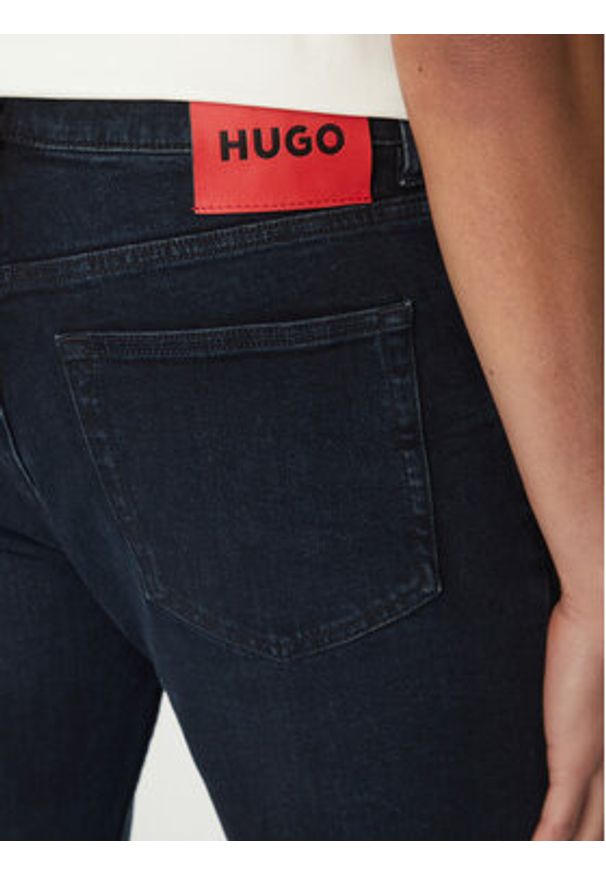 Hugo - HUGO Jeansy 50530581 Granatowy Extra Slim Fit. Kolor: niebieski
