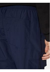 Adidas - adidas Spodnie dresowe Trefoil Essentials Woven Cargo JD2454 Granatowy Regular Fit. Kolor: niebieski. Materiał: syntetyk #5