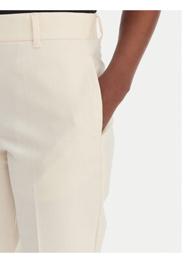 Calvin Klein Chinosy LV044B916G Écru Regular Fit. Materiał: bawełna