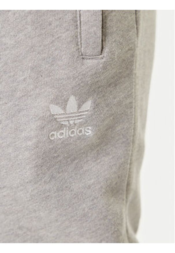 Adidas - adidas Spodnie dresowe Trefoil Essentials JY6271 Szary Slim Fit. Kolor: szary. Materiał: bawełna