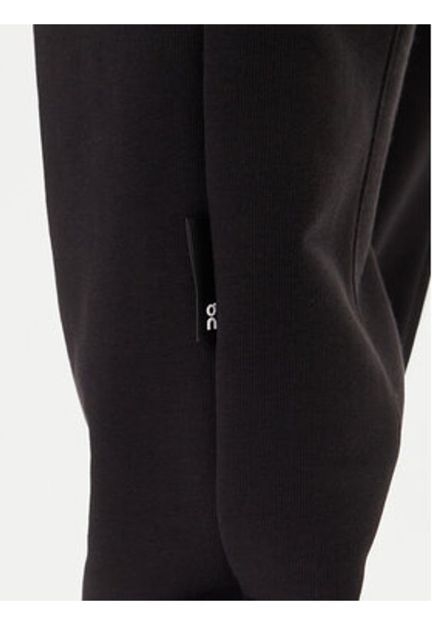 On Spodnie dresowe Club Pants 1ME1004 Czarny Relaxed Fit. Kolor: czarny. Materiał: bawełna