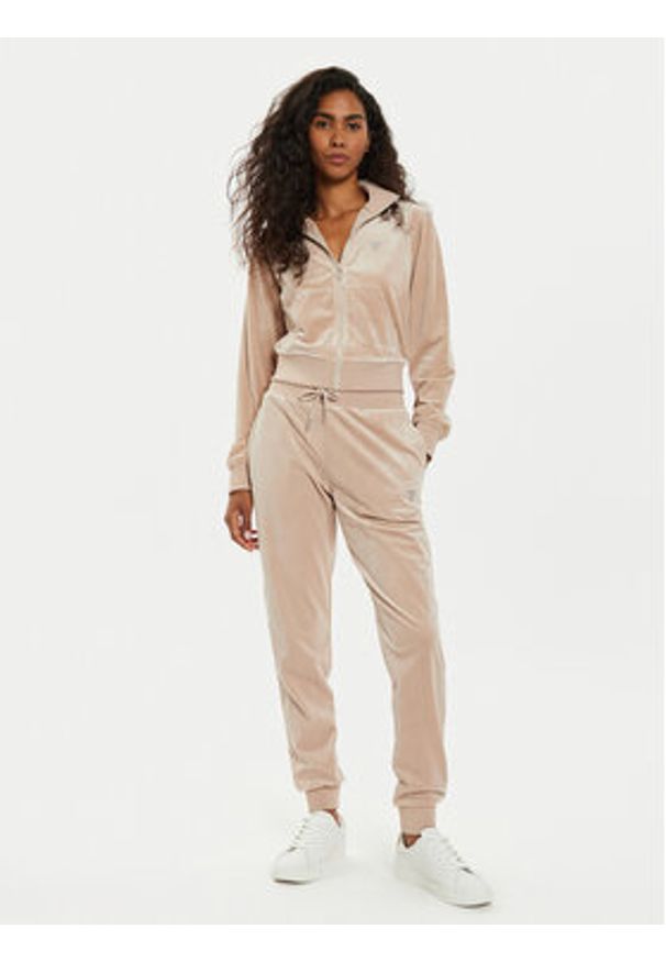 Guess Spodnie dresowe V3BB27 KBXI2 Beżowy Regular Fit. Kolor: beżowy. Materiał: syntetyk