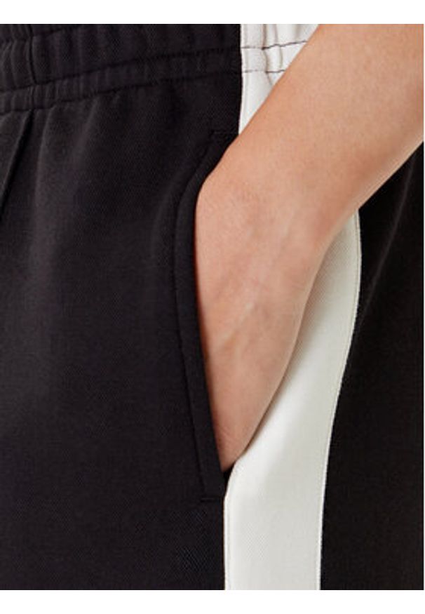 Karl Kani Spodnie dresowe PD00005427 Czarny Regular Fit. Kolor: czarny. Materiał: syntetyk