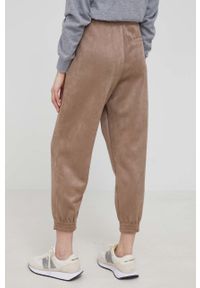 DKNY - Dkny spodnie P1KKSL20 damskie kolor brązowy joggery high waist. Stan: podwyższony. Kolor: brązowy. Materiał: dzianina #3
