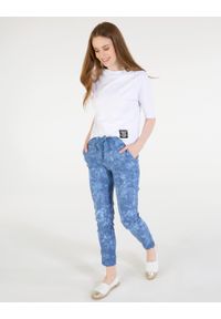 Unisono - SPODNIE CIENIOWANE 205-50069X JEANS. Materiał: jeans