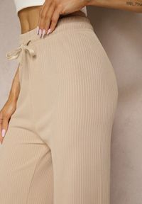 Renee - Beżowe Spodnie o Szerokim Kroju High Waist Savianne. Okazja: na co dzień. Stan: podwyższony. Kolor: beżowy. Sezon: wiosna. Styl: casual