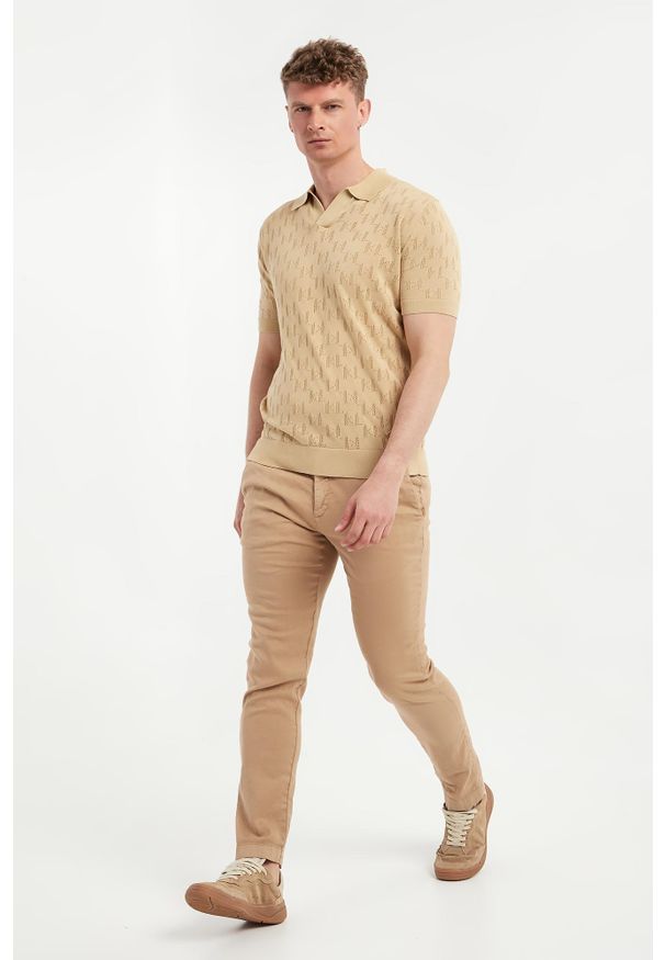 Karl Lagerfeld - Polo męskie z ażurowym logo KARL LAGERFELD. Typ kołnierza: polo. Wzór: ażurowy