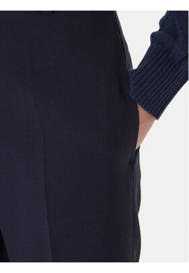 TOMMY HILFIGER - Tommy Hilfiger Spodnie materiałowe WW0WW48355 Granatowy Straight Fit. Kolor: niebieski. Materiał: syntetyk