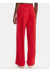 Adidas - adidas Spodnie dresowe adicolor Classic Firebird JW1225 Czerwony Loose Fit. Kolor: czerwony. Materiał: syntetyk #4