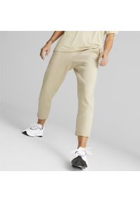Spodnie Dresowe Sportowe Damskie Puma Evostripe. Kolor: beżowy. Materiał: dresówka. Sport: fitness