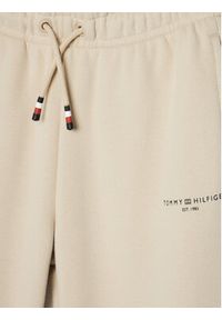 TOMMY HILFIGER - Tommy Hilfiger Spodnie dresowe KS0KS00596 Beżowy Regular Fit. Kolor: beżowy. Materiał: bawełna