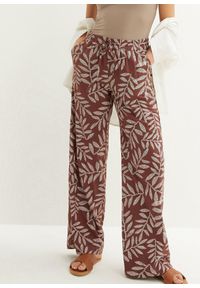 bonprix - Spodnie palazzo z nadrukiem. Kolor: brązowy. Wzór: nadruk. Styl: elegancki #1
