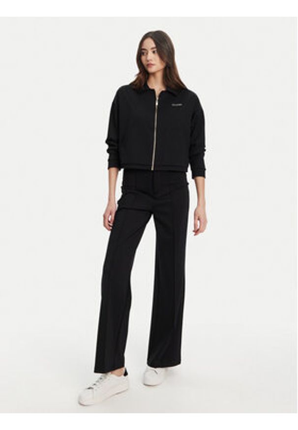 Guess Spodnie materiałowe V5YB11 KCX42 Czarny Regular Fit. Kolor: czarny. Materiał: syntetyk