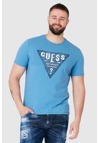 Guess - GUESS Niebieski t-shirt męski z dużym logo. Kolor: niebieski. Wzór: nadruk