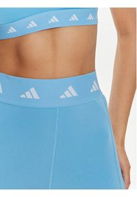 Adidas - adidas Legginsy Techfit Stash IU1864 Błękitny Slim Fit. Kolor: niebieski. Materiał: syntetyk. Technologia: Techfit (Adidas)