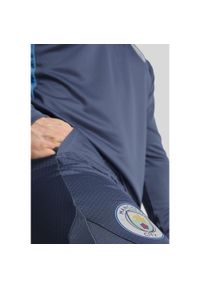 Puma - Męskie spodnie treningowe Manchester City PUMA Inky Blue Magic. Kolor: niebieski