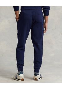 Ralph Lauren - RALPH LAUREN - Granatowe spodnie dresowe Jogger. Kolor: niebieski. Materiał: dresówka. Wzór: napisy, haft #3