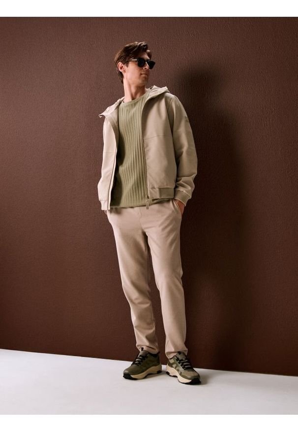 Sinsay - Spodnie dresowe jogger ottoman - beżowy. Kolor: beżowy. Materiał: dresówka