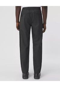 Burberry - BURBERRY - Czarne spodnie jogger. Kolor: czarny. Materiał: materiał. Wzór: aplikacja