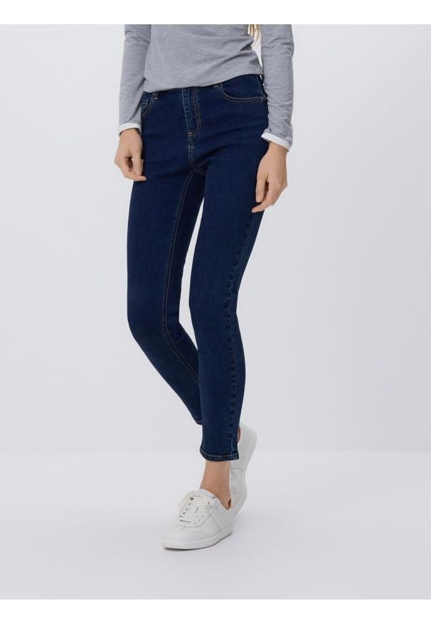 Reserved - Jeansy slim push up - granatowy. Kolor: niebieski