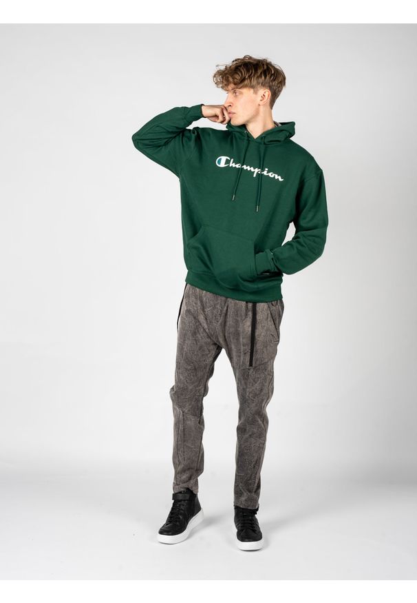 Champion Bluza "Hoodie" | HBGF89HY07718 | Mężczyzna | Zielony. Okazja: na co dzień. Typ kołnierza: kaptur. Kolor: zielony. Materiał: bawełna, poliester. Wzór: aplikacja. Styl: casual