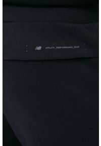 New Balance spodnie dresowe męskie kolor czarny gładkie. Kolor: czarny. Materiał: dresówka. Wzór: gładki #3