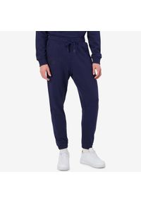 Spodnie do biegania Kappa Giavo. Kolor: niebieski. Materiał: dresówka. Długość: długie #1