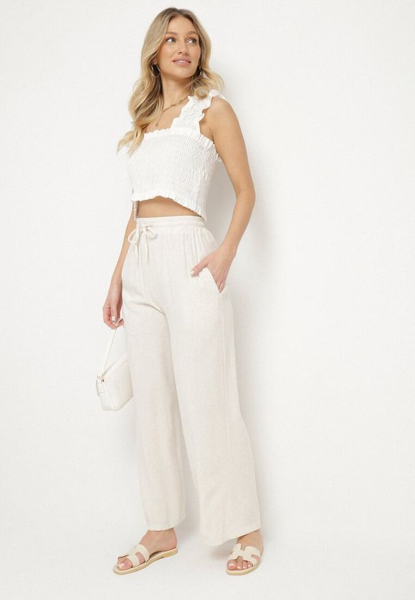 Born2be - Jasnobeżowe Szerokie Spodnie Typu Palazzo z Wysokim Stanem i Wiązaniem Sonalissa. Okazja: na co dzień. Stan: podwyższony. Kolor: beżowy. Styl: boho, casual