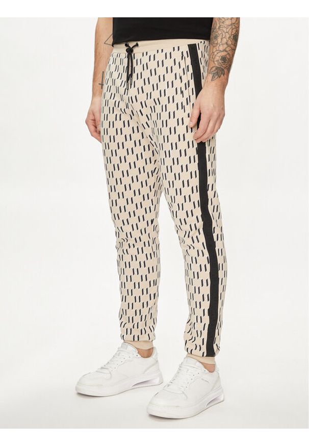 Karl Lagerfeld - KARL LAGERFELD Spodnie dresowe 705077 542951 Beżowy Regular Fit. Kolor: beżowy. Materiał: bawełna