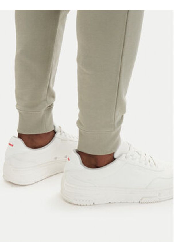 Hugo - HUGO Spodnie dresowe Doak212 50447963 Zielony jasny Regular Fit. Kolor: zielony. Materiał: bawełna