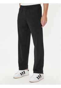 Adidas - adidas Spodnie dresowe adicolor Classics Firebird JY1350 Czarny Regular Fit. Kolor: czarny. Materiał: syntetyk