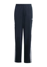 Adidas - adidas Spodnie dresowe Firebird Track KE0910 Czarny Regular Fit. Kolor: czarny. Materiał: syntetyk #5