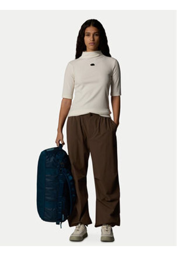 The North Face Bluzka NF0A89C3 Beżowy Slim Fit. Kolor: beżowy. Materiał: syntetyk, bawełna
