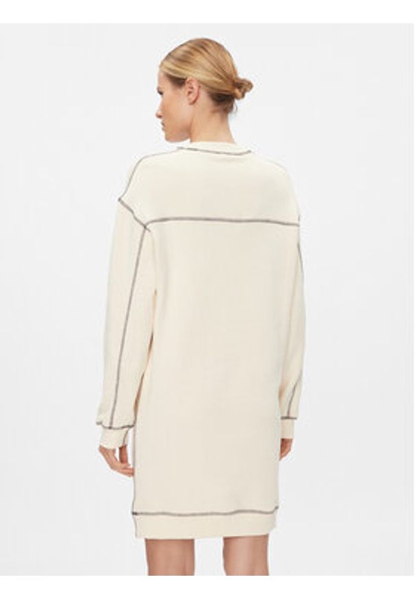 TOMMY HILFIGER - Tommy Hilfiger Sukienka dzianinowa Varsity 85 WW0WW40614 Beżowy Relaxed Fit. Kolor: beżowy. Materiał: bawełna