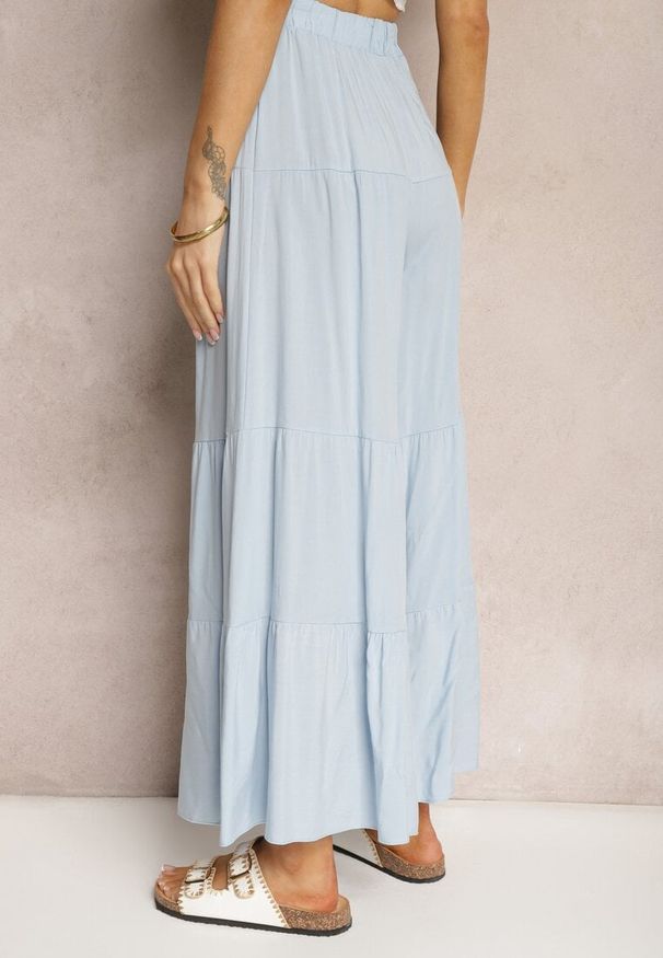 Renee - Jasnoniebieskie Spodnie z Szerokimi Nogawkami Palazzo z Falbankami i Gumką w Pasie Dimlin. Okazja: do pracy, na spotkanie biznesowe. Kolor: niebieski. Materiał: materiał. Wzór: aplikacja. Styl: elegancki, biznesowy