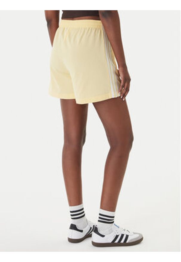 Adidas - adidas Szorty sportowe Firebird Classic KD3669 Żółty Regular Fit. Kolor: żółty. Materiał: syntetyk