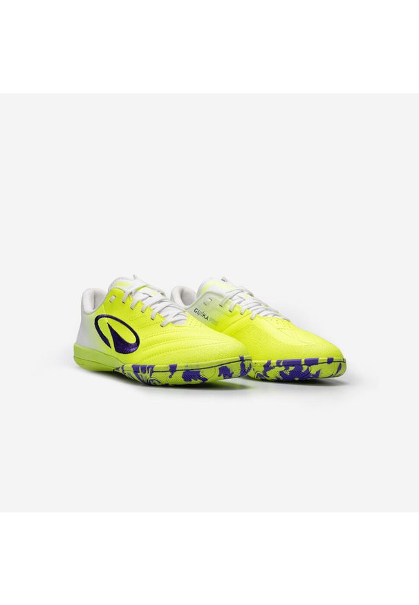KIPSTA - Buty do piłki nożnej halowej dla dzieci Kipsta Ginka Pro. Kolor: fioletowy, zielony, wielokolorowy, żółty. Materiał: kauczuk. Wzór: gładki. Sport: piłka nożna
