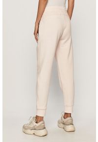 DKNY - Dkny - Spodnie. Kolor: różowy. Materiał: bawełna, poliester, dzianina. Wzór: gładki #4