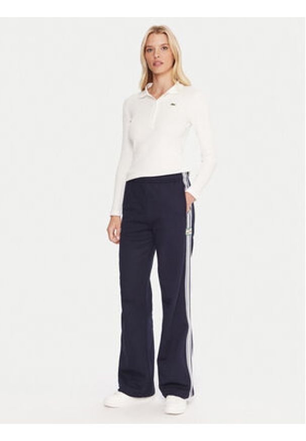 Lacoste Spodnie dresowe XF5250 Granatowy Regular Fit. Kolor: niebieski. Materiał: bawełna