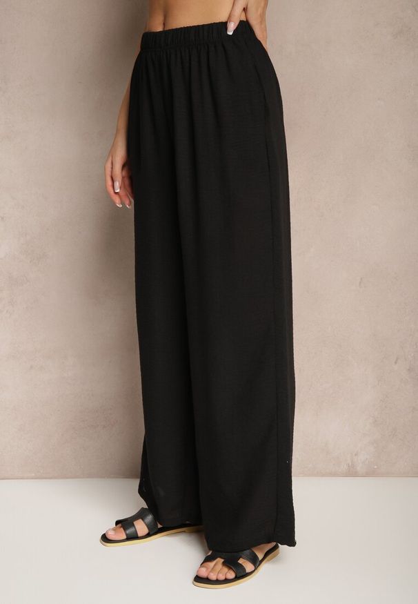 Renee - Czarne Spodnie Palazzo o Szerokim Kroju High Waist Ollevia. Okazja: na co dzień, na spotkanie biznesowe. Stan: podwyższony. Kolor: czarny. Materiał: jedwab. Wzór: aplikacja. Styl: biznesowy, elegancki, casual
