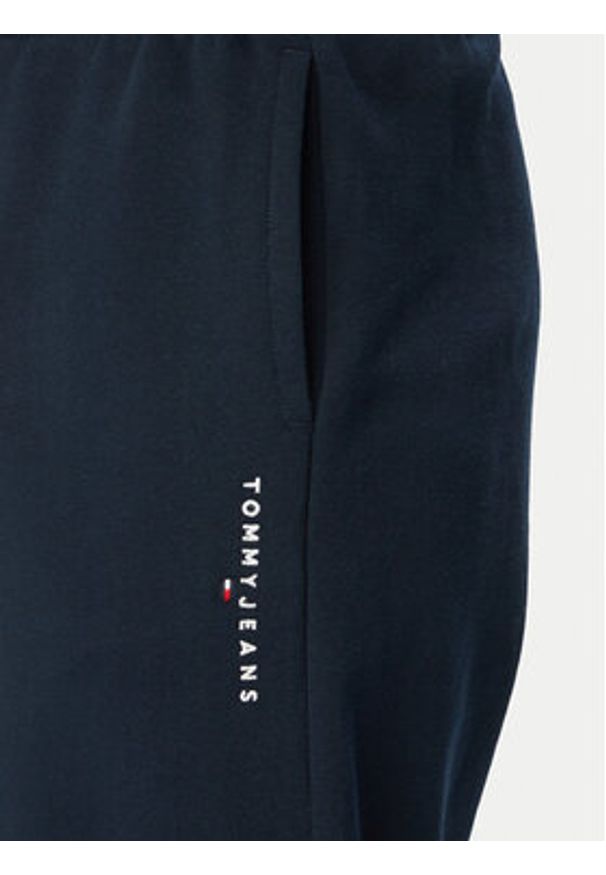 Tommy Jeans Spodnie dresowe Linear DM0DM23014 Granatowy Regular Fit. Kolor: niebieski. Materiał: bawełna